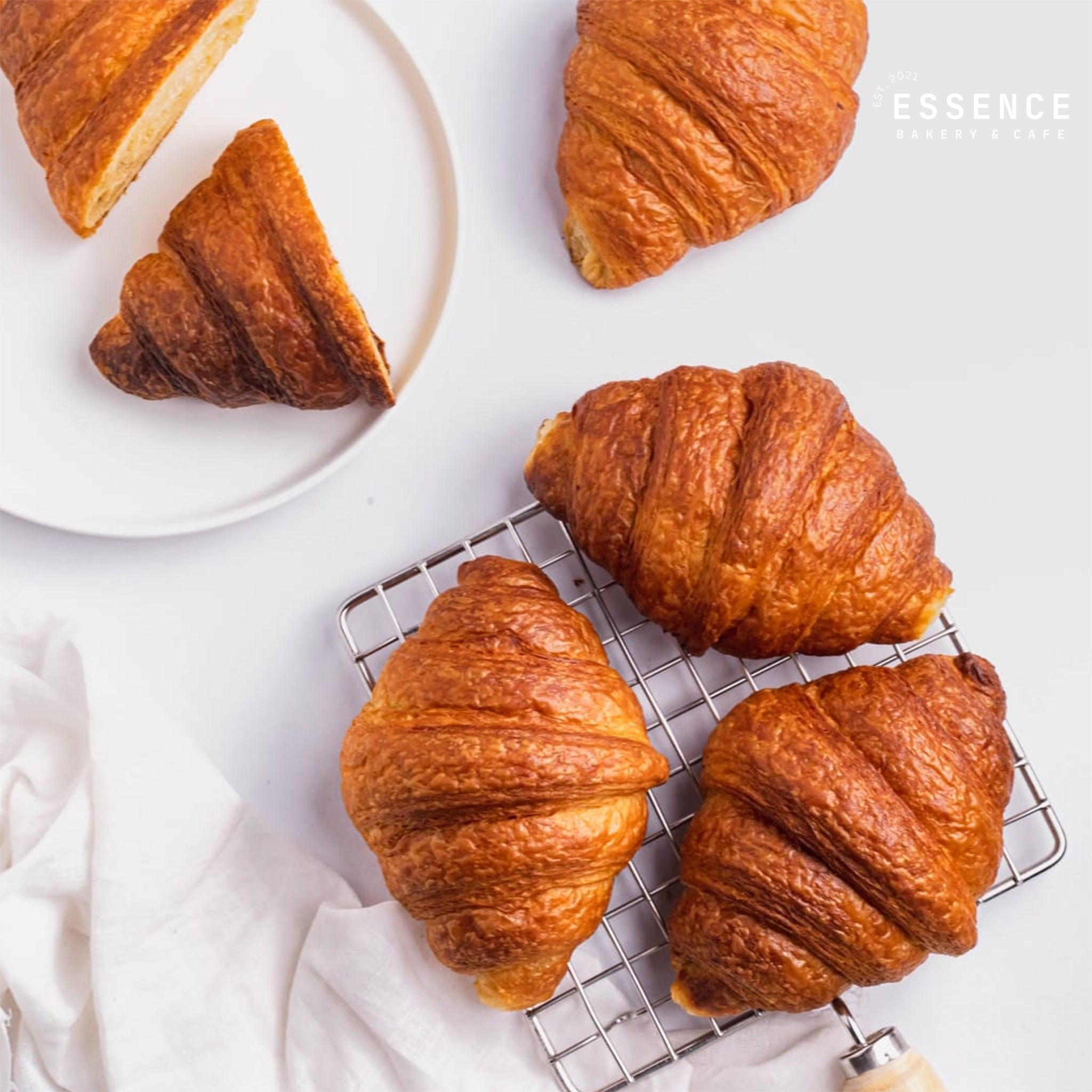 eggless butter croissant by essence bakery & cafe